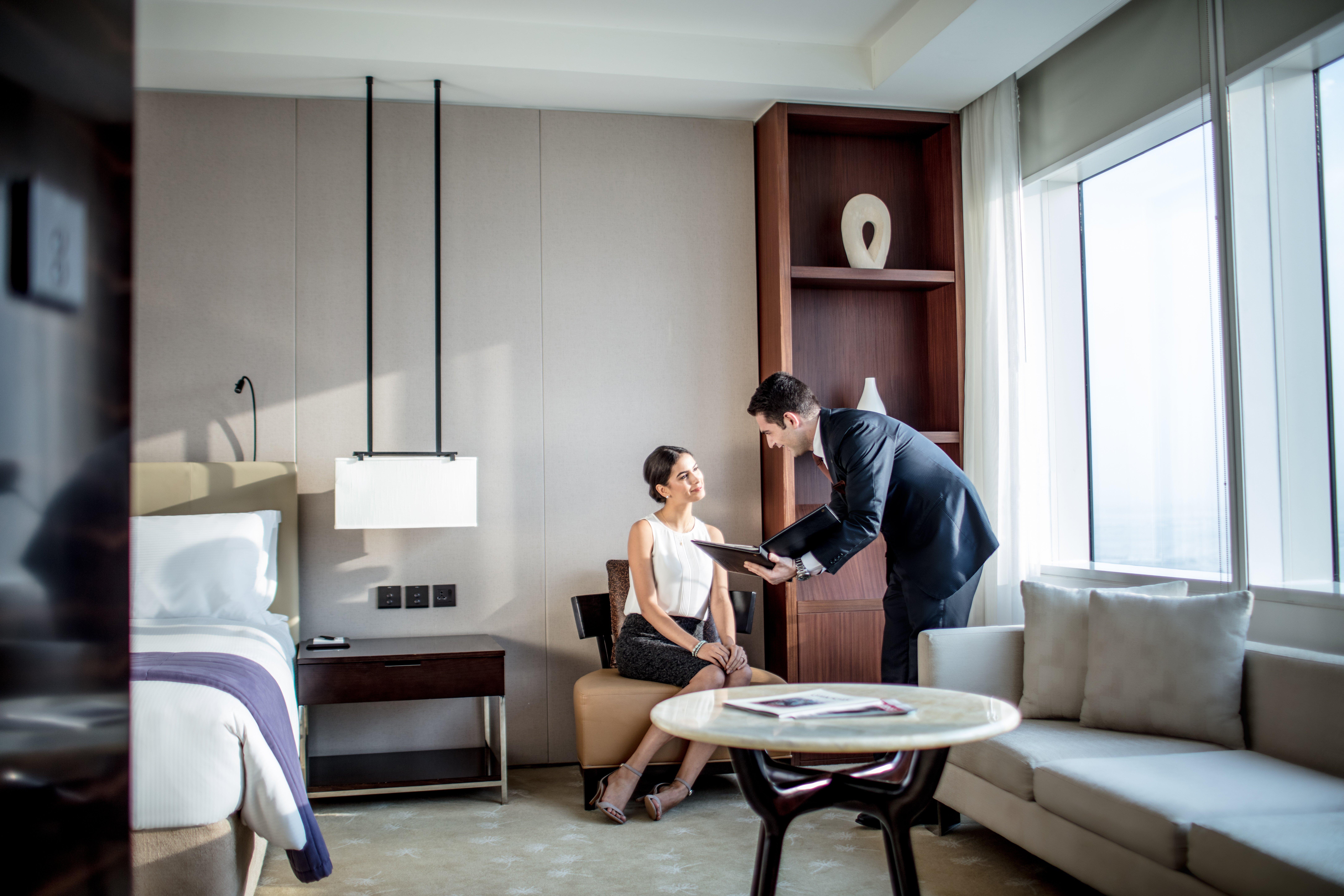 Intercontinental Dubai Festival City By Ihg Eksteriør bilde A guest being served by a butler at the Park Hyatt Hyderabad