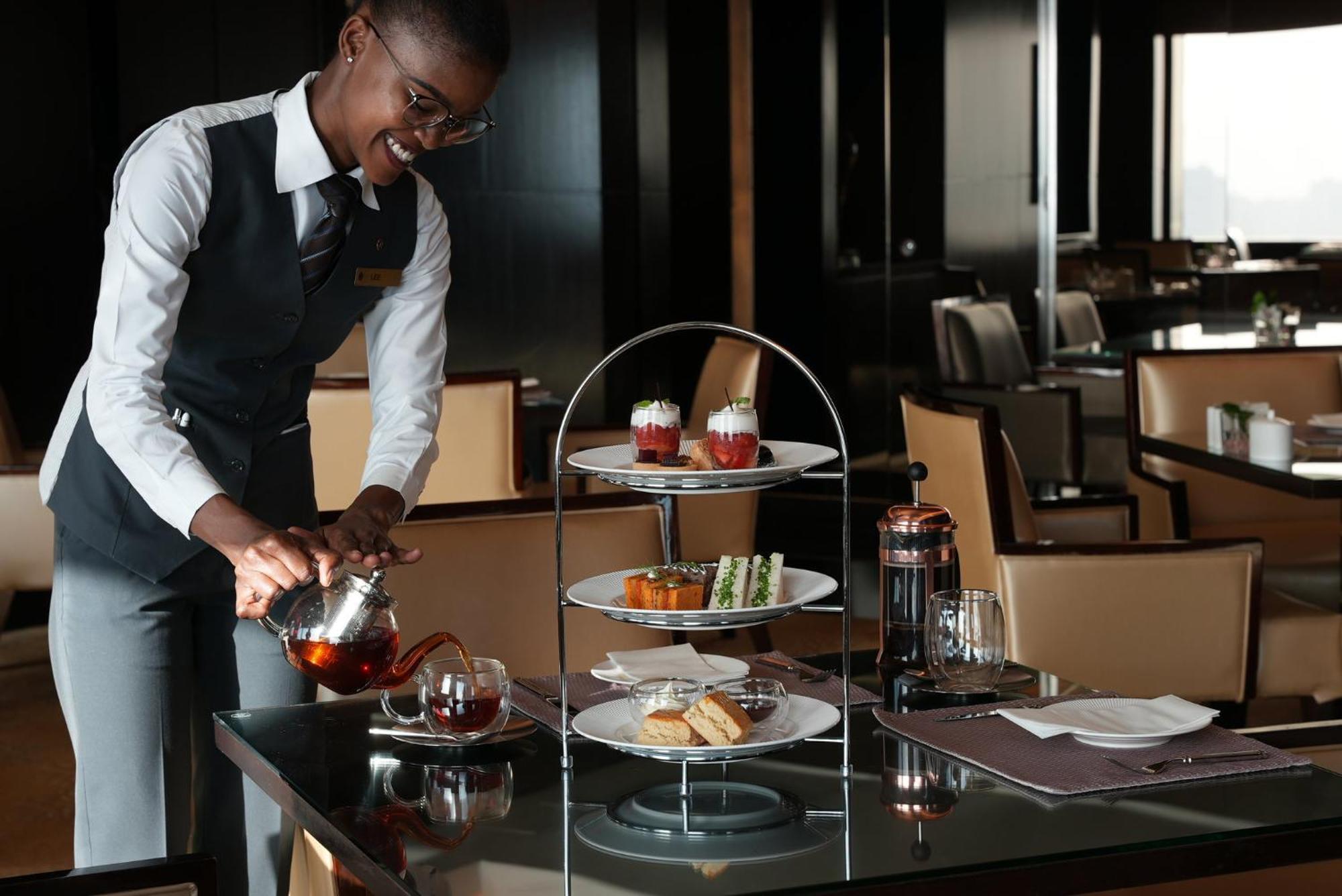 Intercontinental Dubai Festival City By Ihg Eksteriør bilde Afternoon tea at the Emirates Lounge in Dubai International Airport